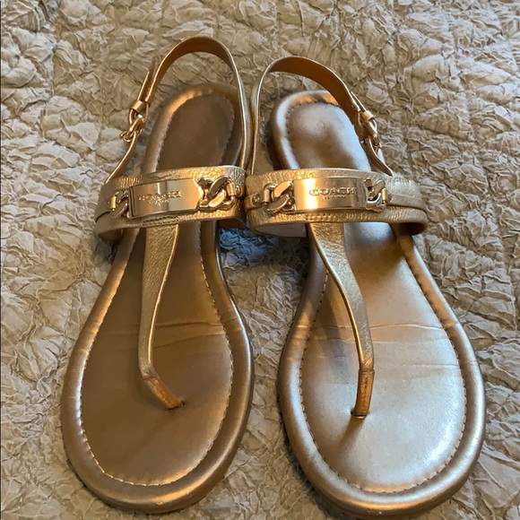 coach gold flip flops